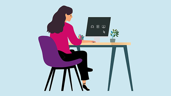 Woman looking at laptop