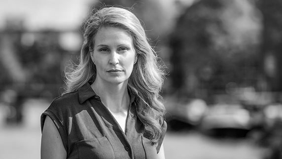 Full Budget Update report Woman by river