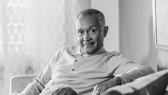 Man relaxing on sofa