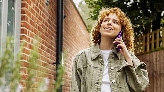 Woman calling outdoors