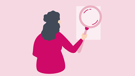 Woman with magnifying glass